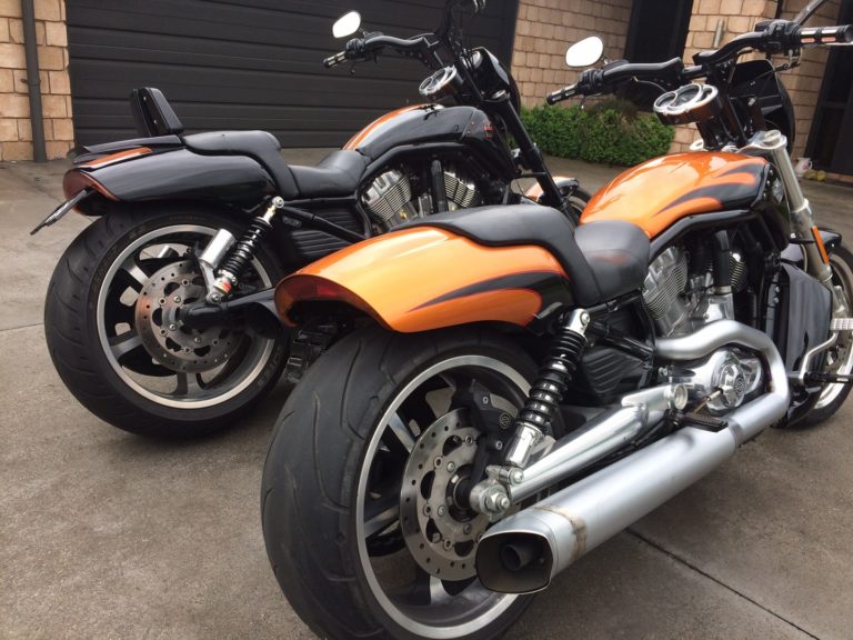 2 vrod motorbikes lined up next to each other