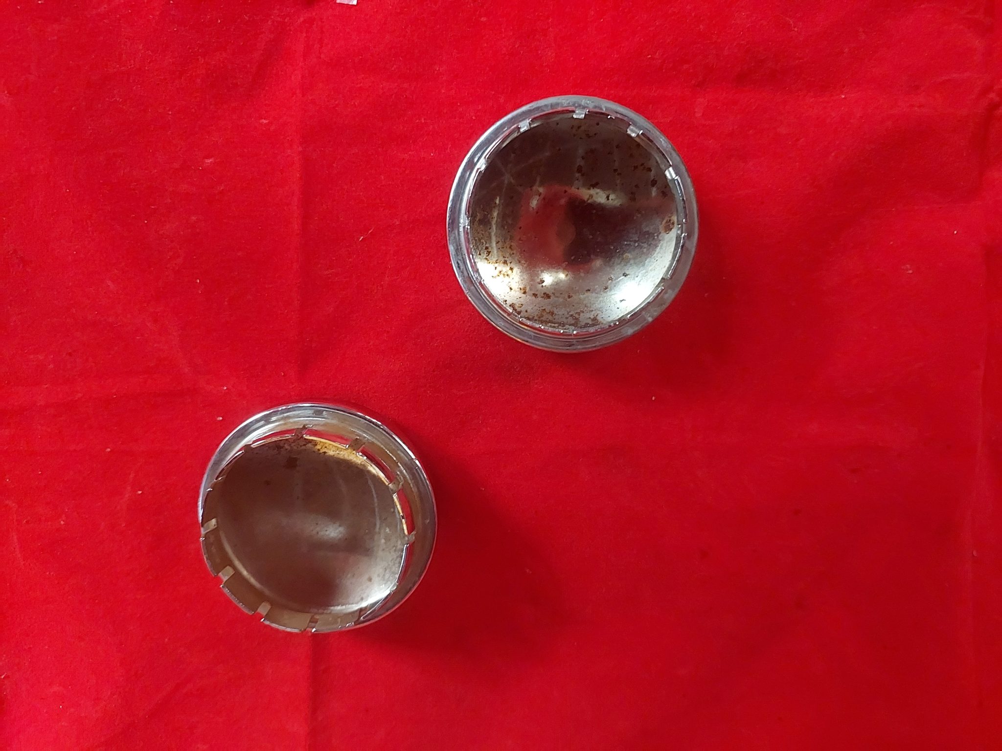 Chrome swingarm axle covers